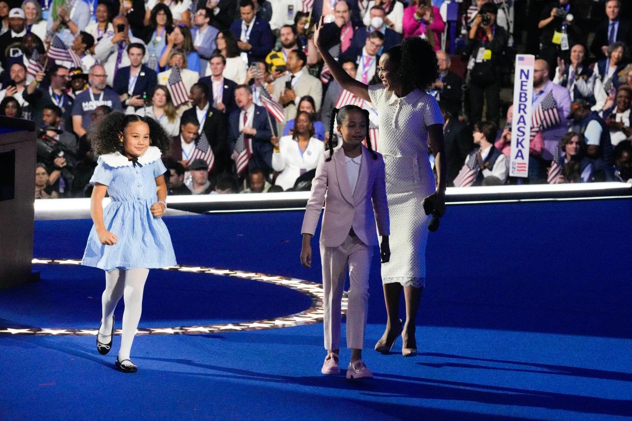 Kerry Washington with Leela and Amara Ajagu, grandnieces of Kamala Harris during the final day of the Democratic National Convention at the United Center.