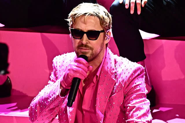 <p>PATRICK T. FALLON/AFP via Getty</p> Ryan Gosling performs 'I'm Just Ken' at the 2024 Oscars