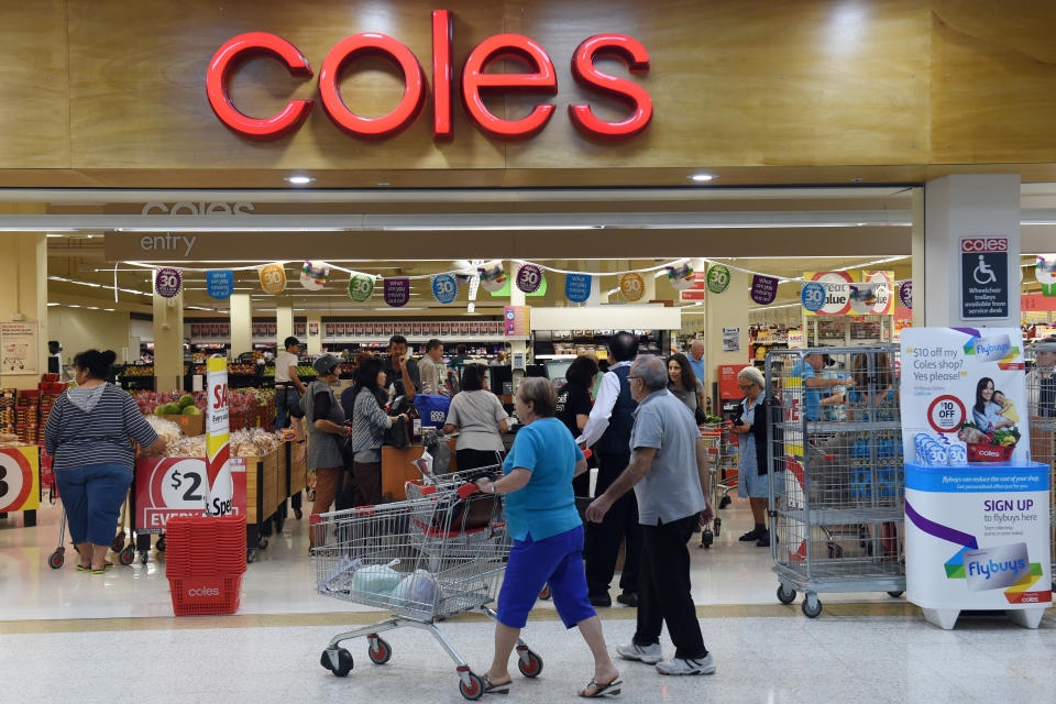 Shoppers queue at the registers at a Coles supermarket in Sydney on Thursday, Oct. 22, 2015. (AAP Image/Paul Miller)