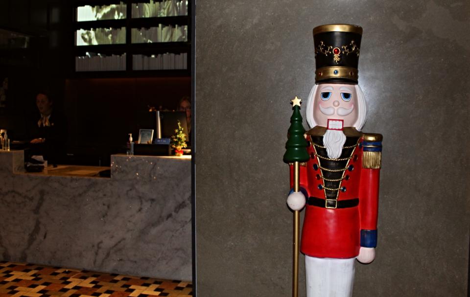 An oversized nutcracker is located near the front desk of the Purdue Union Club Hotel for guests to greet as they check-in. A special overnight experience is available at the hotel on Dec. 8.