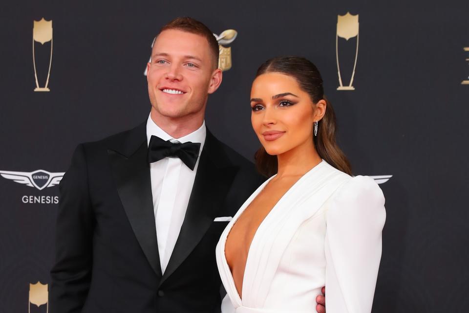 MIAMI, FL - FEBRUARY 01:  Carolina Panthers running back Christian McCaffrey  and Olivia Culpo pose on the Red Carpet poses prior to the NFL Honors on February 1, 2020 at the Adrienne Arsht Center in Miami, FL.   (Photo by Rich Graessle/PPI/Icon Sportswire via Getty Images)