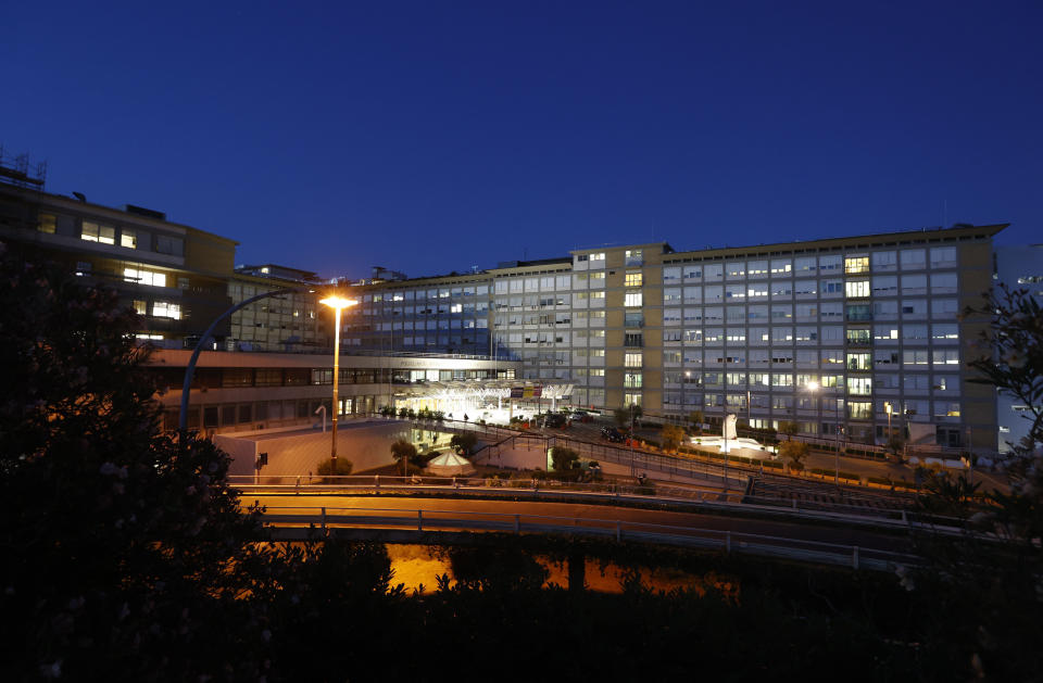 A nocturnal view of Rome's Gemelli Polyclinic where Pope Francis was hospitalized in the afternoon for a scheduled surgery for a stenosis, or restriction, of the large intestine, Sunday, July 4, 2021. The news came just three hours after Francis had cheerfully greeted the public in St. Peter's Square and told them he will go to Hungary and Slovakia in September. (AP Photo/Riccardo De Luca)