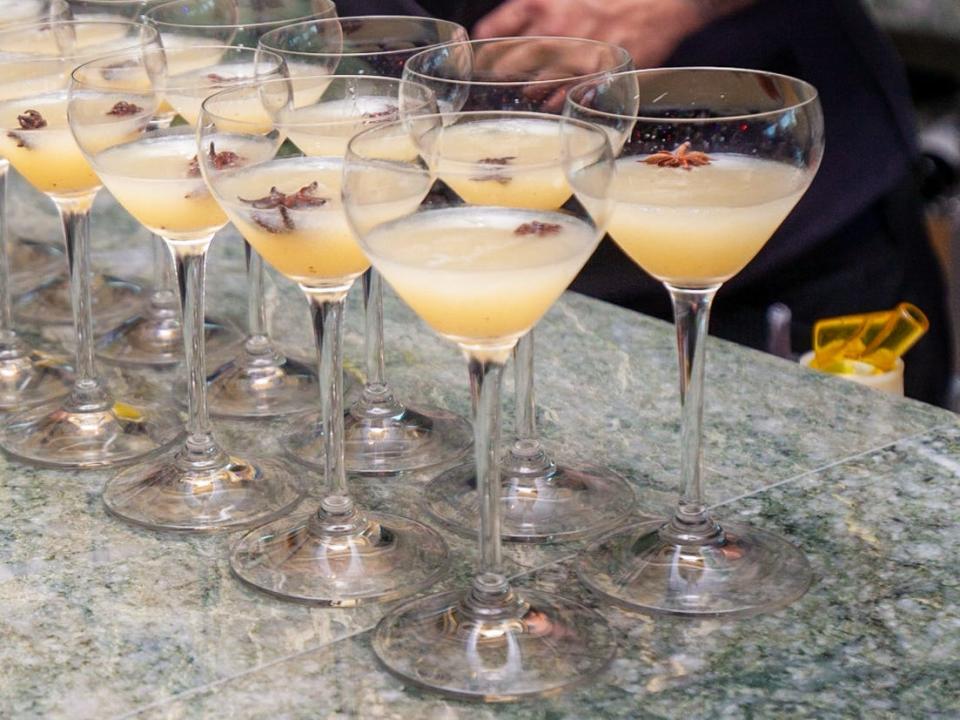 a bartender preparing drinks at Eden