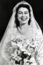 <p><strong>Wedding date: </strong>November 20, 1947</p><p><strong>Wedding tiara: </strong>Queen Elizabeth wore Queen Mary's Russian Fringe tiara on her wedding day. The piece of jewelry was made for Queen Mary, the grandmother of Queen Elizabeth, in 1919 and can be worn as a necklace or atop the head. <a href="https://www.townandcountrymag.com/leisure/arts-and-culture/news/a8451/queen-elizabeth-prince-philip-wedding/" rel="nofollow noopener" target="_blank" data-ylk="slk:Elizabeth's tiara famously broke on her wedding day,;elm:context_link;itc:0;sec:content-canvas" class="link ">Elizabeth's tiara famously broke on her wedding day,</a> but was quickly repaired. </p>