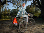 <p>“Born-again Christian Calvin Moffitt and his dog Shakira live in Cross City, Fla. Although he has a Trump-Pence bumper sticker on his tricycle, he couldn’t vote because he’s a convicted felon. At the time he told me he hoped they wouldn’t repeal Obamacare as he is dependent on it and not old enough for Medicare just yet.” (Photograph and caption by Naomi Harris) </p>