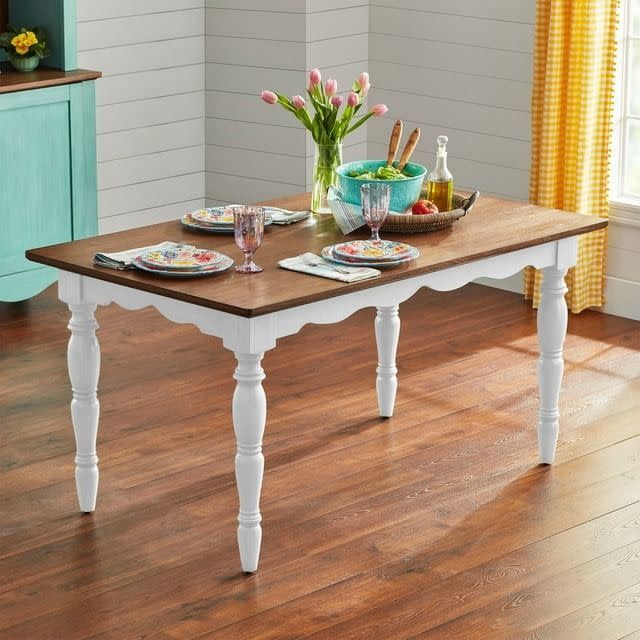 <p><a href="https://go.redirectingat.com?id=74968X1596630&url=https%3A%2F%2Fwww.walmart.com%2Fip%2FThe-Pioneer-Woman-Dining-Table-Made-With-Solid-Wood-Frame-Teal%2F5195114754&sref=https%3A%2F%2F" rel="nofollow noopener" target="_blank" data-ylk="slk:Shop Now;elm:context_link;itc:0;sec:content-canvas" class="link rapid-noclick-resp">Shop Now</a></p><p>The Pioneer Woman Dining Table in White</p><p>$268.00</p>