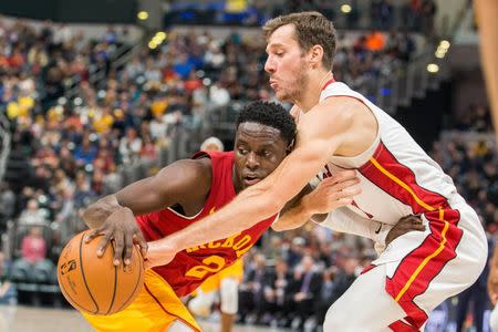 Nov 16, 2018; Indianapolis, IN, USA; Indiana Pacers guard Darren Collison (2) dribbles the ball while Miami Heat guard Goran Dragic (7) defends in the second half at Bankers Life Fieldhouse. Mandatory Credit: Trevor Ruszkowski-USA TODAY Sports