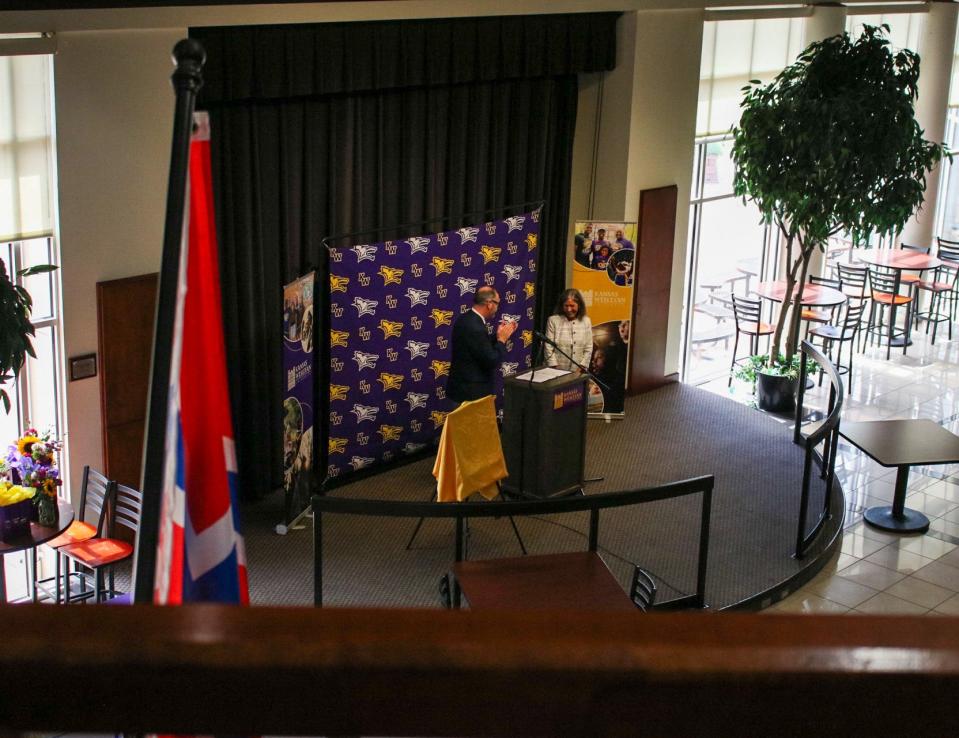 Kansas Wesleyan University President Matt Thompson thanks Mollie Hale Carter and her family for a $1.5 million gift to Kansas Wesleyan's Community Resilience Hub Aug. 2.