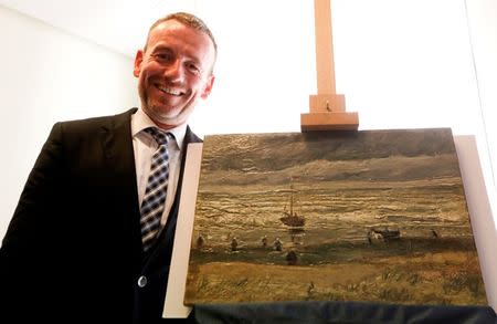 Director of Amsterdam's Van Gogh Museum Axel Ruger poses next to a painting by the Dutch artist Vincent Van Gogh, that was stolen in Amsterdam 14 years ago, during a news conference in Naples September 30, 2016. REUTERS/Ciro De Luca