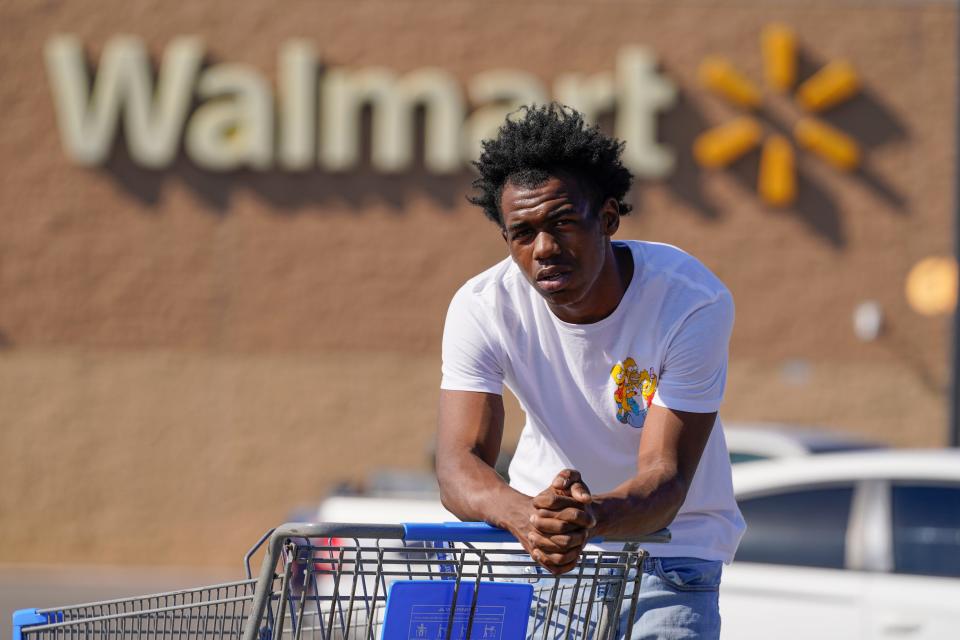 Bryant West, who has a job at a Walmart, poses for a portrait in Pascagoula, Miss., Friday, Oct. 20, 2023. Girls consistently are outperforming boys, graduating at higher rates at public high schools around the country. Students, educators and researchers say there are several reasons why boys are falling short.