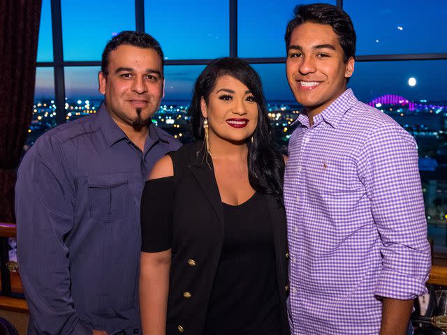 <p>Jordan Murph/Getty</p> Bill Arriaga, Suzette Quintanilla and Jovan Arriaga during the Media Welcome for the MAC Selena World Premier on September 29, 2016 in Corpus Christi, Texas.