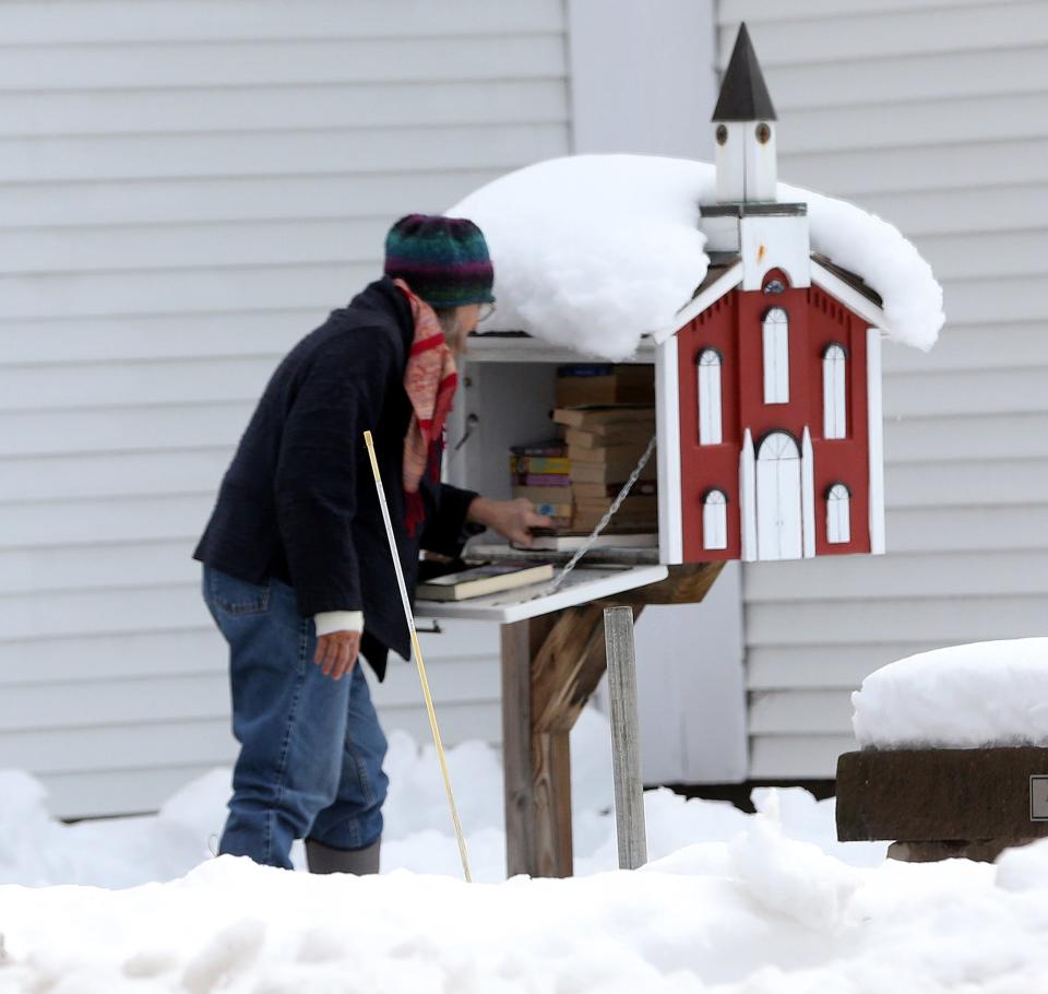Following a big storm, book library at the First United Methodist Church in Rochester is covered in snow as residents dig out and some still are without power April 5, 2024.