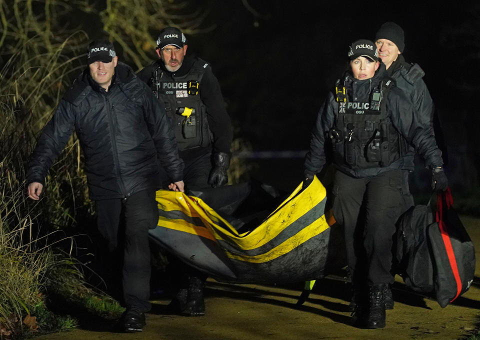 Emergency personnel at the scene in Babbs Mill Park in Kingshurst, Solihull after a serious incident where several people are believed to be in a critical condition after being pulled from the lake. Picture date: Sunday December 11, 2022.