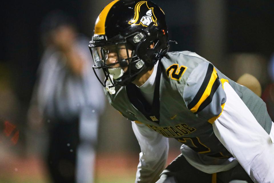 The Naples Golden Eagles compete against the American Heritage Patriots in a game at Staver Field in Naples on Friday, Sept. 13, 2024. Naples lost 23-3.