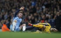 <p>Britain Football Soccer – Manchester City v Arsenal – Premier League – Etihad Stadium – 18/12/16 Manchester City’s Kevin De Bruyne is shown a yellow card after this challenge on Arsenal’s Gabriel Paulista Action Images via Reuters / Carl Recine Livepic </p>