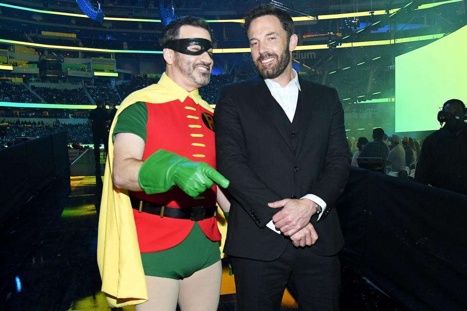 <p>Jimmy Kimmel, dressed as Robin, and Ben Affleck chat backstage at Global Citizen <em>Vax Live: The Concert to Reunite the World</em> at SoFi Stadium in Inglewood, California on Sunday.</p>