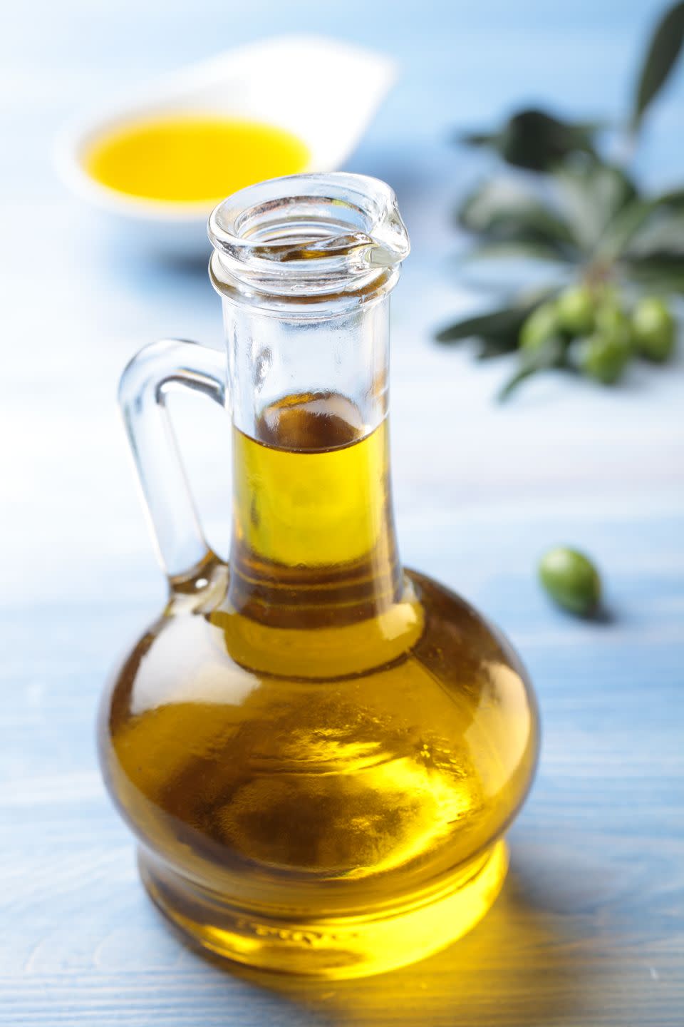 <p>Olive oil not labeled "extra-virgin" (sometimes be called "refined olive oil" or "light olive oil") is another healthy option. </p><p>Though the word "refined" doesn’t exactly have a great reputation in the nutrition world, in this case it’s a game-changer, says Lakatos Shames. While refining olive oil strips out some antioxidants, it also raises its smoke point. </p><p>Bonus perks: regular ol' olive oil is less expensive and has a more neutral flavor than EVOO.</p><p>Opt for light or refined olive oil for high-heat cooking like pan-frying.</p><p><em>Nutrition per tablespoon: 119 calories, 13.5 g fat (1.9 g saturated, 9.9 g monounsaturated, 1.4 g polyunsaturated), 0 mg sodium, 0 g carbs, 0 g sugar, 0 g fiber, 0 g protein</em></p>