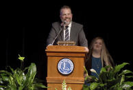 Indiana State NCAA college football coach Curt Mallory shares a humorous story during a celebration of life for victims of a tragic car crash that left three students dead and two hospitalized with serious injuries, four of them football players, Monday, Aug. 29, 2022, in Terre Haute, Ind. (Joseph C. Garza/The Tribune-Star via AP)
