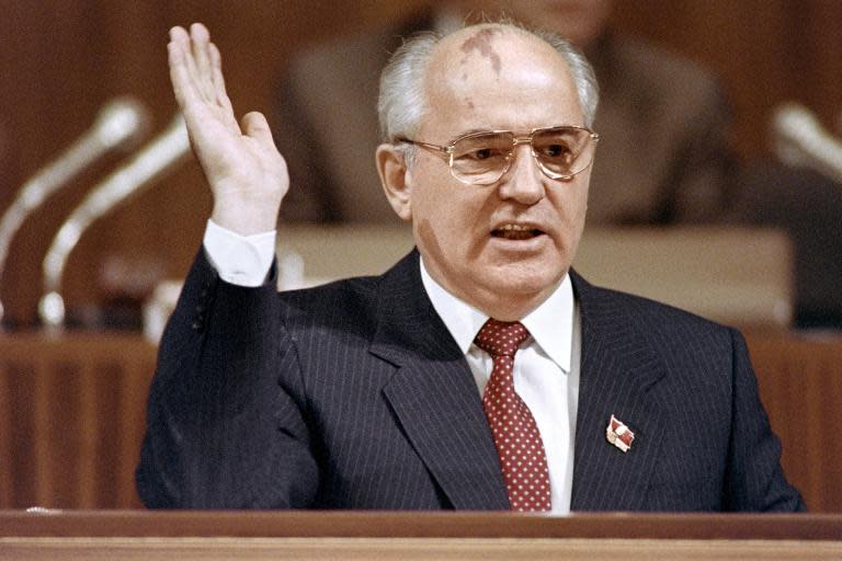 Soviet President Mikhail Gorbachev gestures as he addresses to the 28th Congress Soviet Communist Party (CPSU) in Moscow on July 10, 1990