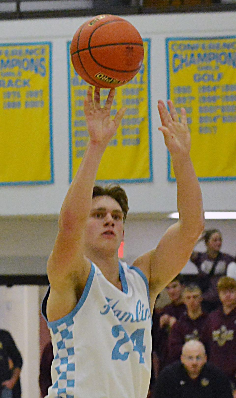 Hamlin's Dawson Noem fires away during a high school boys-girls basketball doubleheader against Milbank on Thursday, Dec. 21, 2023 at the Hamlin Education Center. Hamlin's boys won 63-43.