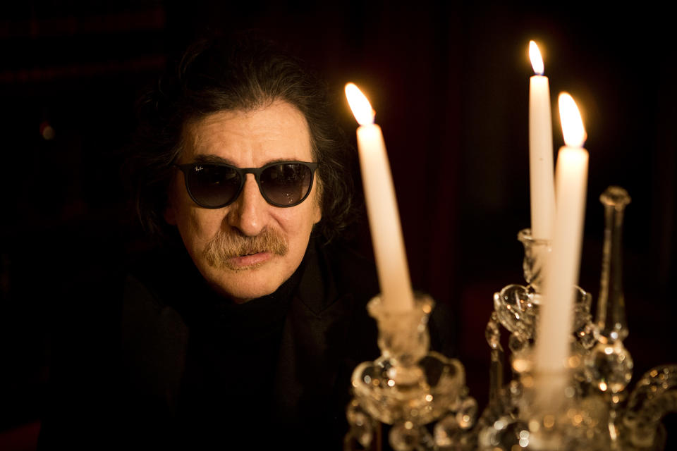 Argentine rock legend Charly Garcia poses for a portrait before an interview in Buenos Aires, Argentina, Wednesday, Aug. 14, 2013. Garcia, who is 61 and has a vast career that defined and inspired the rock and pop music world in Latin America, will perform two shows at Teatro Colon, Argentina's landmark opera house, on Sept. 23 and 30. (AP Photo/Victor R. Caivano)
