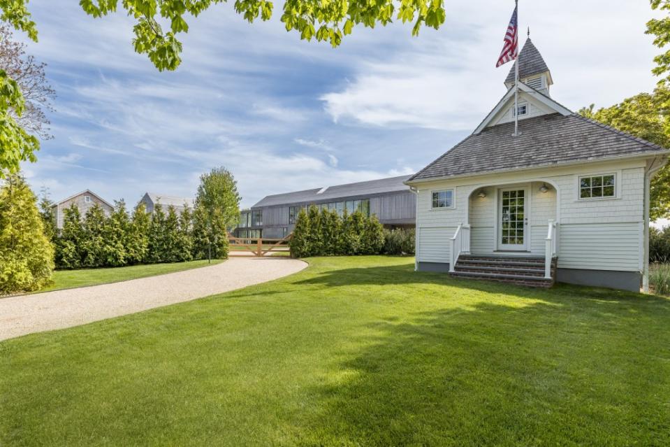 The exterior of the restored school house. Hedgerow Exclusive Properties