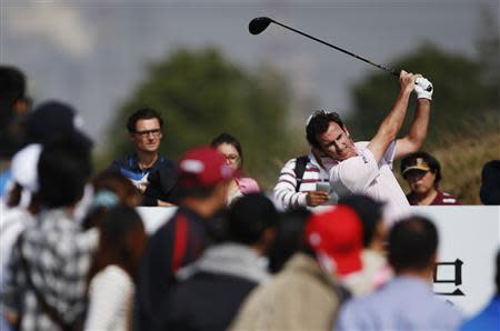 Gonzalo Fernandez-Castano of Spain tees off on the 7th hole during the BMW Masters 2013 golf tournament at Lake Malaren Golf Club in Shanghai October 27, 2013. REUTERS/Aly Song