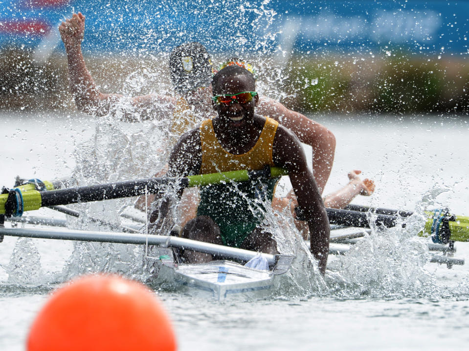 WINDSOR, ENGLAND - AUGUST 02: Sizwe Ndlovu, John Smith, Matthew Brittain and James Thompson of South Africa celebrate after winning gold in the Lightweight Men's Four final on Day 6 of the London 2012 Olympic Games at Eton Dorney on August 2, 2012 in Windsor, England. (Photo by Damien Meyer - IOPP Pool /Getty Images)