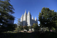 FILE - In this Oct. 5, 2019, file photo, the Salt Lake Temple of the Church of Jesus Christ of Latter-Day Saints is shown in Salt Lake City. The discredited practice of conversion therapy for LGBTQ children is now banned in Utah, making it the 19th state and one of the most conservative to prohibit it. (AP Photo/Rick Bowmer, File)