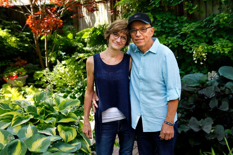 Toty Ramos poses with his wife Janis at their home in 2019, which was featured on the Lakeside Garden Tour. Ramos, best known for leading the local Latin jazz group La Chazz, passed away Jan. 31.