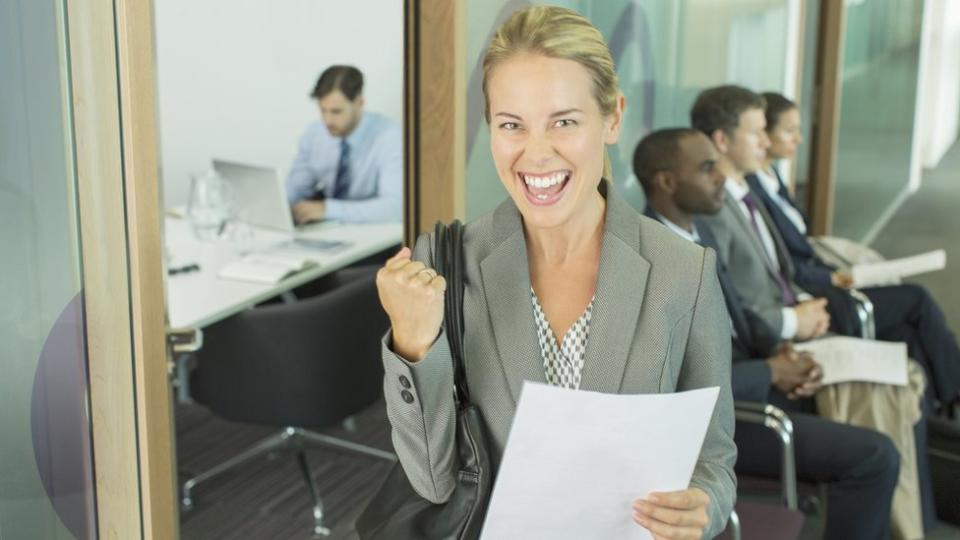 Happy woman after a job interview.