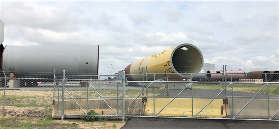 Paulsboro Marine Terminal stores sections of the 400-foot-tall, steel monopiles built here for a planned offshore wind turbine project.  View is from Universal Road, near Mantua Avenue. PHOTO: Sept. 13, 2023.