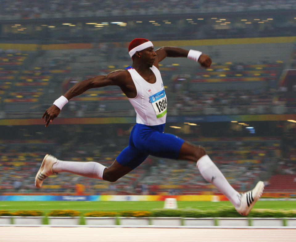 BEIJING - AUGUST 21: Phillips Idowu of Great Britain competes in the Men's Triple Jump Final held at the National Stadium during Day 13 of the Beijing 2008 Olympic Games on August 21, 2008 in Beijing, China. (Photo by Stu Forster/Getty Images)