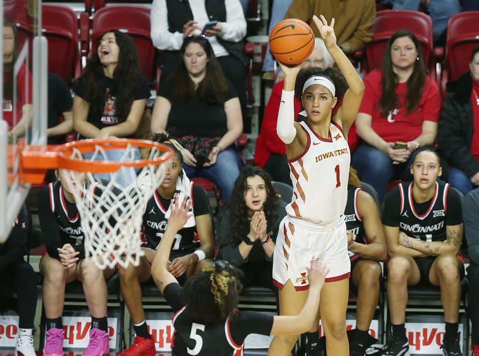 Iowa State Cyclones forward Jalynn Bristow (1) takes a three-point shot over Cincinnati Bearcats guard Braylyn Milton (5) during the second quarter of a NCAA women's basketball at Hilton Coliseum on March 2, 2024, in Ames, Iowa.