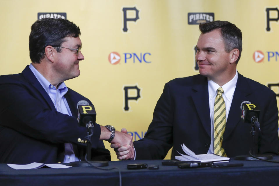 Team owner Bob Nutting, left, shakes hands with Ben Cherington during a news conference where Cherington was introduced as the new general manager of the Pittsburgh Pirates baseball team, Monday, Nov. 18, 2019, in Pittsburgh. (AP Photo/Keith Srakocic)