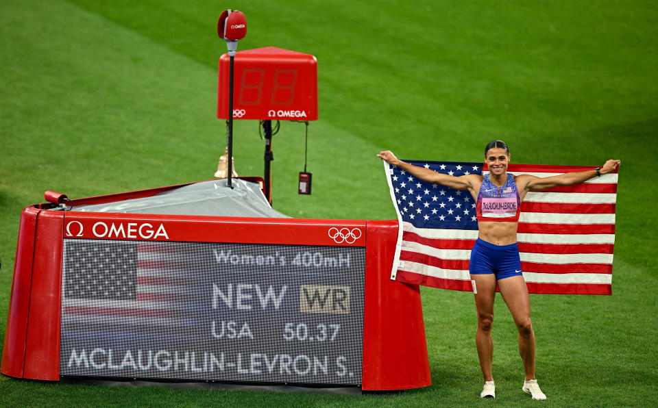 Paris , France - 8 August 2024; Sydney McLaughlin-Levrone of Team United States celebrates after winning gold in the women's 400m hurdles, with a world record time of 50.37s, at the Stade de France during the 2024 Paris Summer Olympic Games in Paris, France. (Photo By Brendan Moran/Sportsfile via Getty Images)