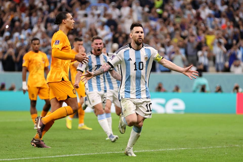Lionel Messi celebrates scoring from the spot (Getty Images)