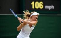 All England Lawn Tennis & Croquet Club, Wimbledon, England - 1/7/15. Russia's Maria Sharapova in action during the second round. Action Images / Tony O'Brien Livepic