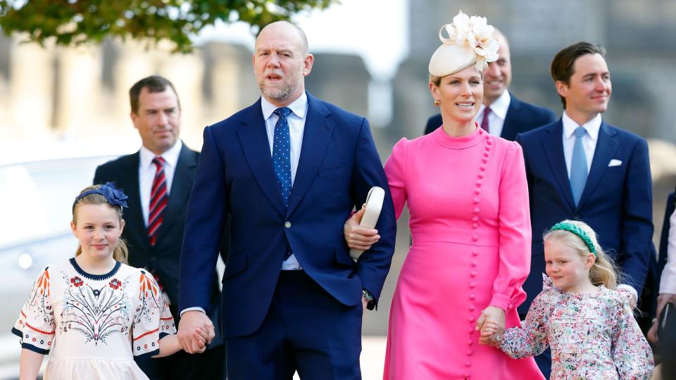 Zara Tindall with husband and children walking in pink dress