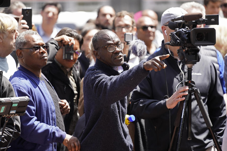 A man yells at San Francisco Mayor London Breed during a rare outdoor meeting of the Board of Supervisors at UN Plaza in San Francisco, Tuesday, May 23, 2023. Mayor Breed attempted to answer questions from supervisors demanding her administration do more to shut down open-air drug dealing, but the meeting had to be moved indoors to City Hall because of disruptions. (AP Photo/Eric Risberg)