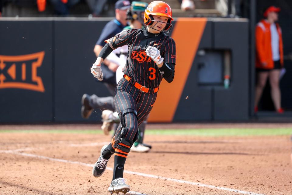 Oklahoma State outfielder Scotland David (3) runs to first during a college softball game between the Oklahoma State Cowgirls (OSU) and the Baylor Bears at Cowgirl Stadium in Stillwater, Okla., on Saturday, March 25, 2023.