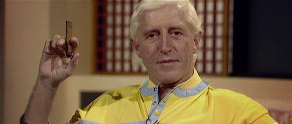 Jimmy Savile is shown trying to dodge awkward questions in a new documentary. (Netflix)