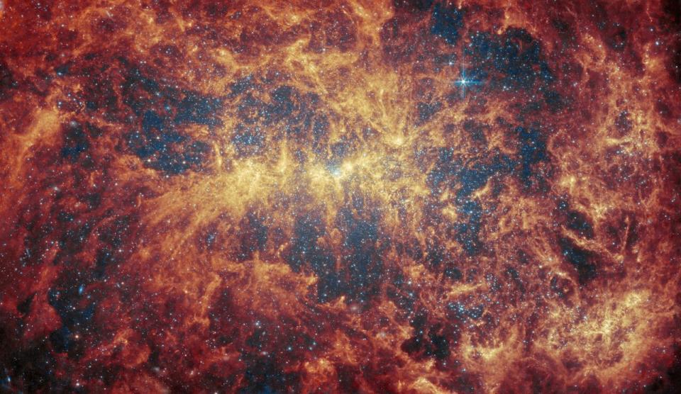 Another view of the studied galaxy, except this one has lots of yellows and reds.