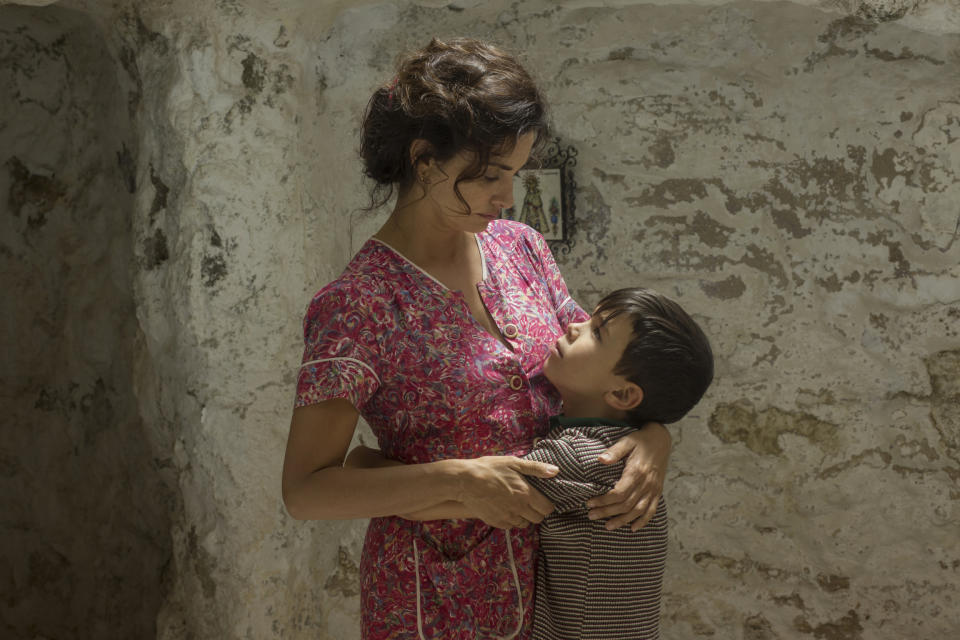 This image released by Sony Pictures Classics shows Penélope Cruz, left, and Asier Flores in a scene from "Pain and Glory," in theaters on Oct. 4. (Manolo Pavón/Sony Pictures Classics via AP)