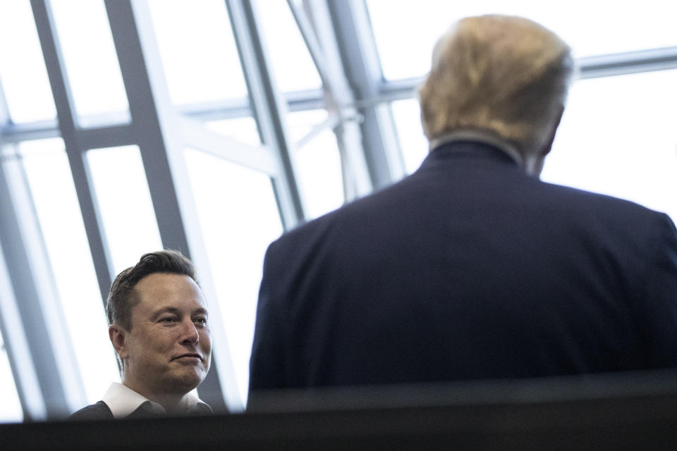 Tesla and SpaceX Chief Executive Officer Elon Musk talks with President Donald Trump speaks after viewing the SpaceX flight to the International Space Station, at Kennedy Space Center, Saturday, May 30, 2020, in Cape Canaveral, Fla. (AP Photo/Alex Brandon)