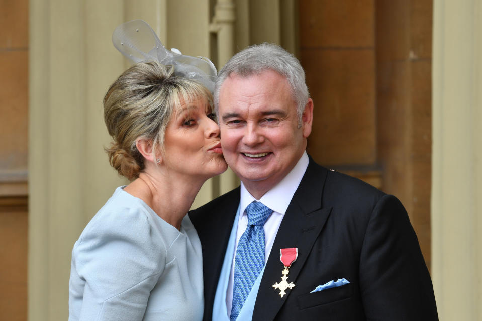 Eamonn Holmes, with his wife Ruth Langsford, as he wears his OBE (Officer of the Order of the British Empire) after it was awarded to him by Queen Elizabeth II for services to broadcasting during an Investiture ceremony at Buckingham Palace in central London.