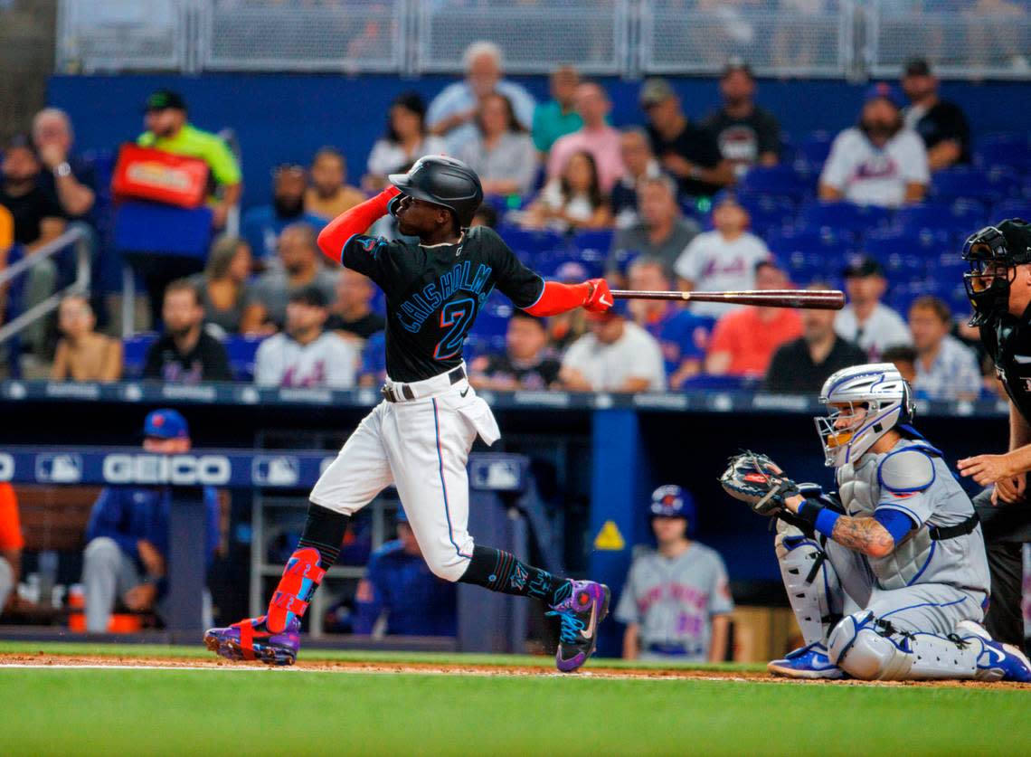 Miami Marlins second baseman Jazz Chisholm Jr. (2) hits a single during the first inning of a baseball game against the New York Mets at LoanDepot Park on Friday, June 24, 2022 in Miami, Florida.