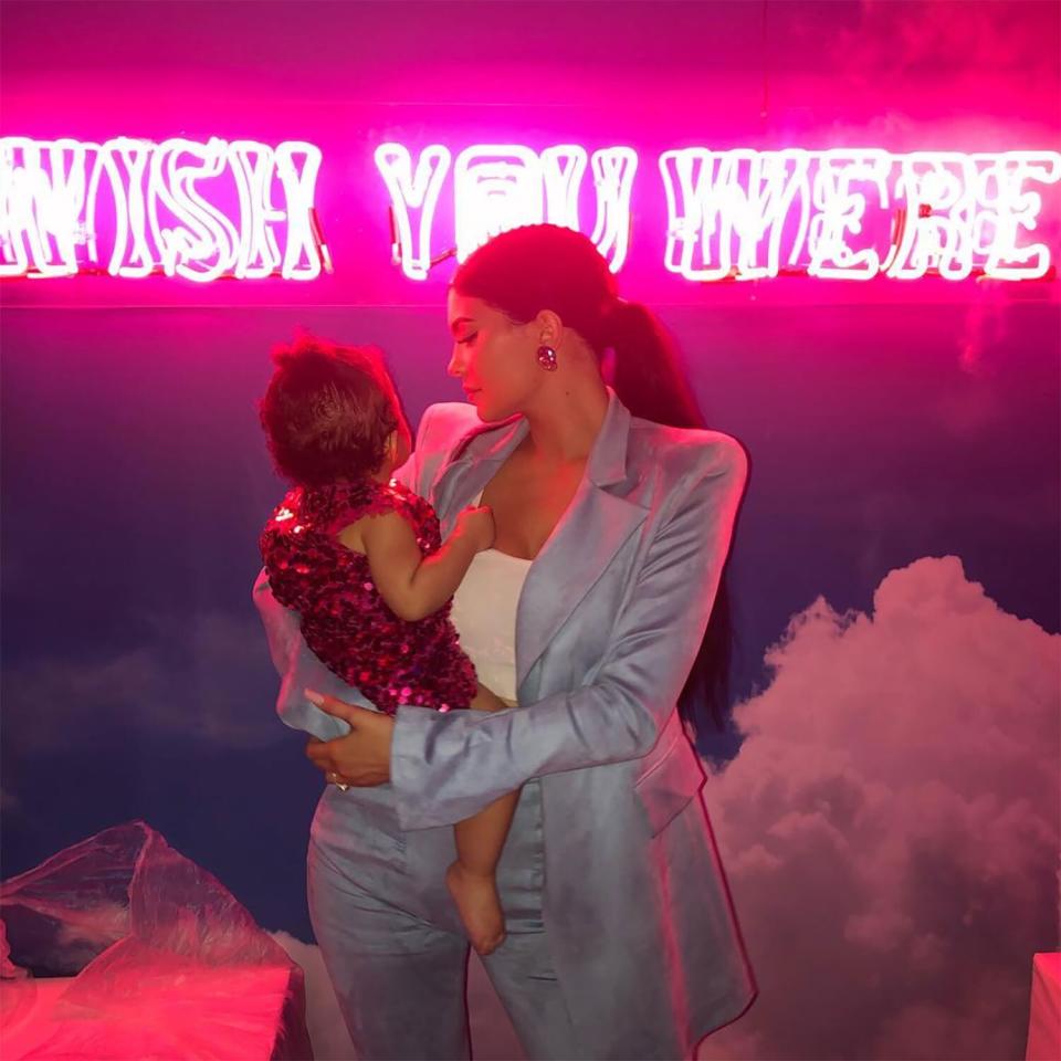 Jenner <a href="https://people.com/parents/kylie-jenner-stormi-first-birthday-party/" rel="nofollow noopener" target="_blank" data-ylk="slk:threw an amusement park-themed 1st birthday;elm:context_link;itc:0;sec:content-canvas" class="link ">threw an amusement park-themed 1st birthday</a> party for Stormi. The theme was Stormiworld, a nod to her dad Travis Scott's <em>Astroworld</em>. “I had to go all out for my baby,” Jenner captioned this photo. 