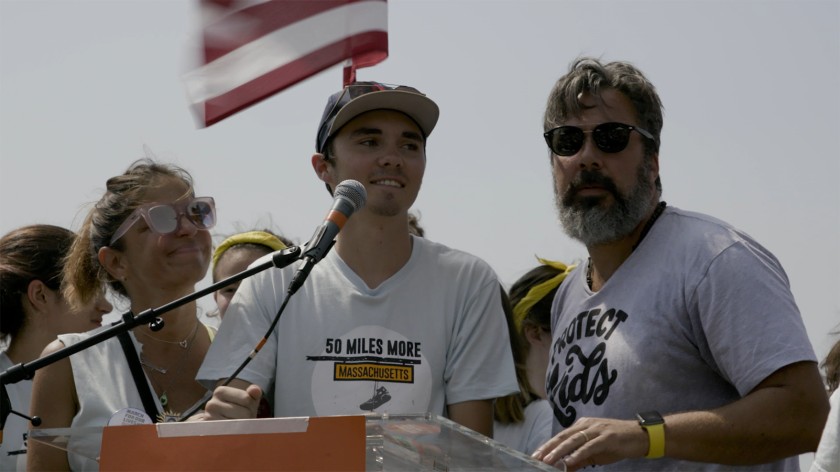 Student activist David Hogg, center, with Patrica and Manuel Oliver, parents of Joaquin Oliver, who was among the 17 people killed Feb. 14, 2018 at Marjory Stoneman Douglas High School, in the documentary "Parkland Rising."