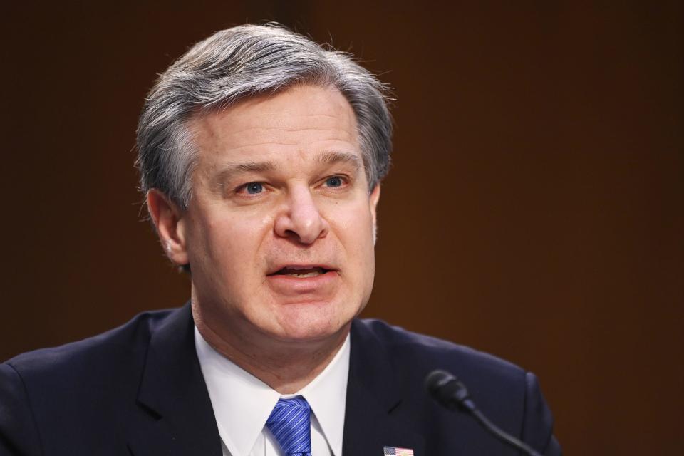 FBI Director Christopher Wray testifies before the Senate Judiciary Committee on the January 6 insurrection on March 2, 2021. / Credit: MANDEL NGAN/POOL/AFP via Getty Images